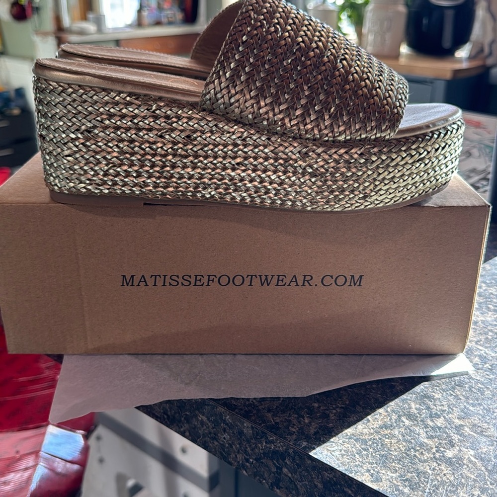 Woven platform gold sandal